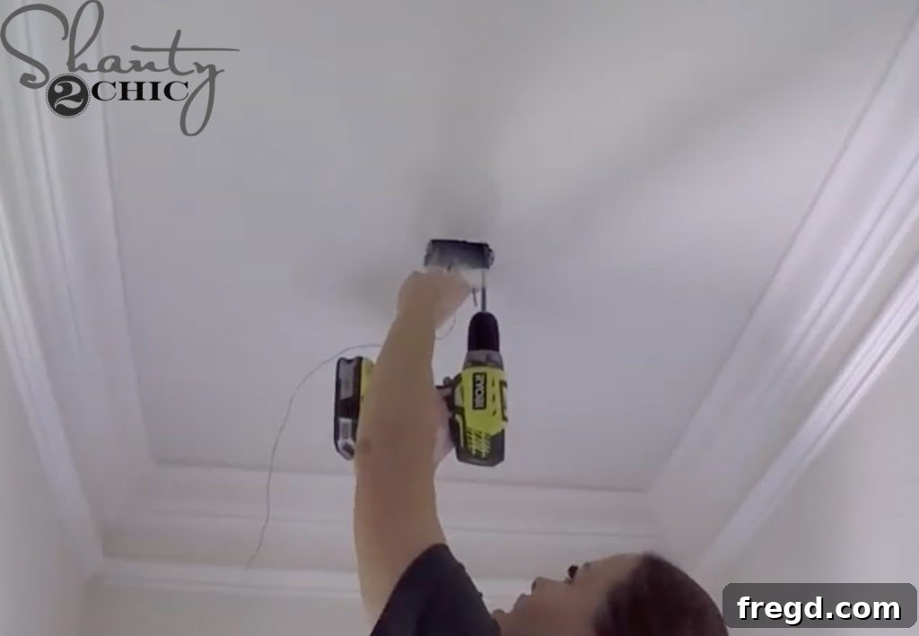 Attaching the light bracket to the electrical box