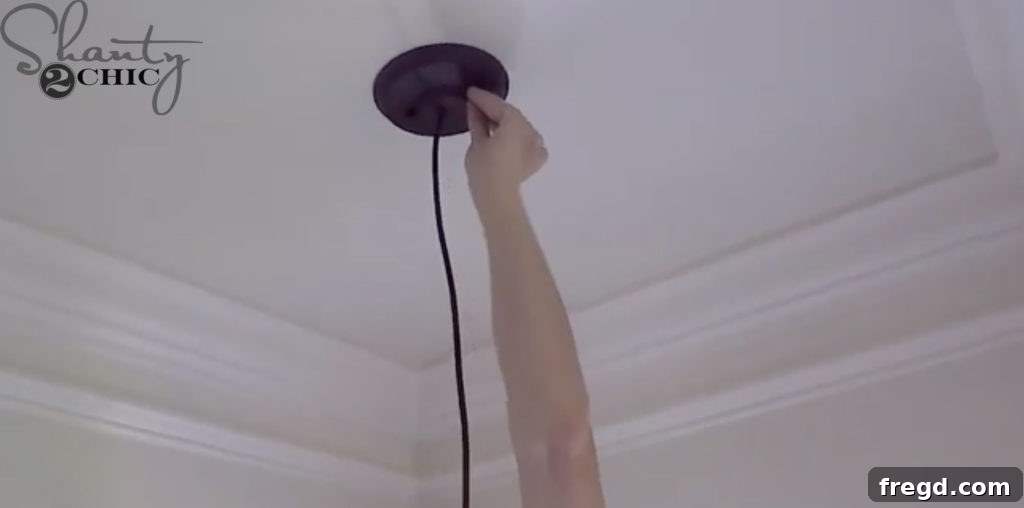 Tucking wires and attaching the ceiling plate
