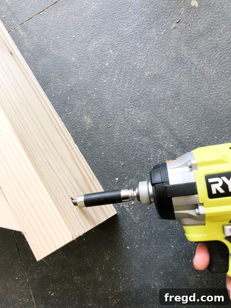 Sawhorse Chic: A DIY Modern Farmhouse Dining Table 14 Sawhorse table base showing diagonal braces attached with finish nails