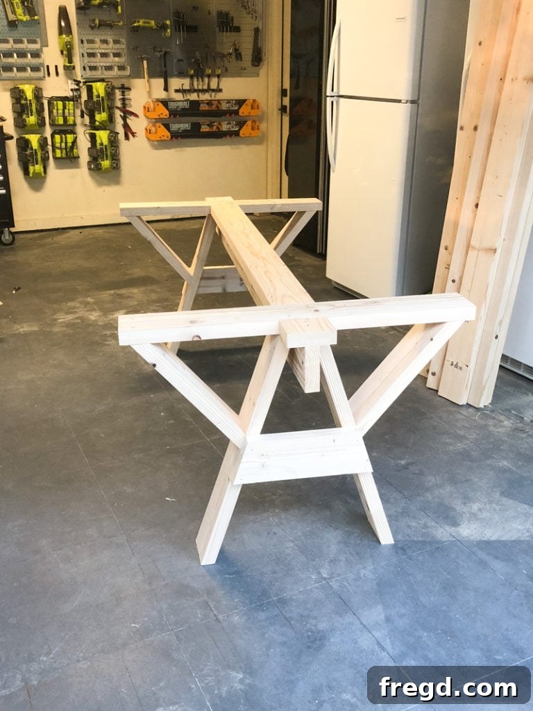 Sawhorse Chic: A DIY Modern Farmhouse Dining Table 26 Detail of the long runner attached to the sawhorse table base