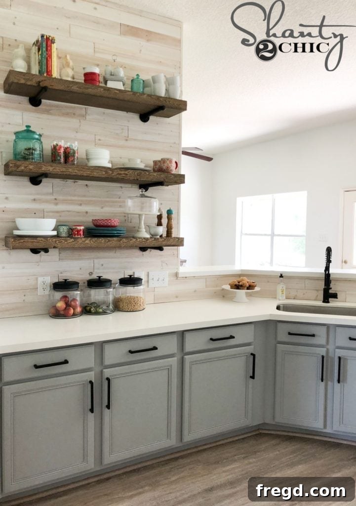 Close-up of the newly painted and extended kitchen cabinets, highlighting the clean, modern finish.