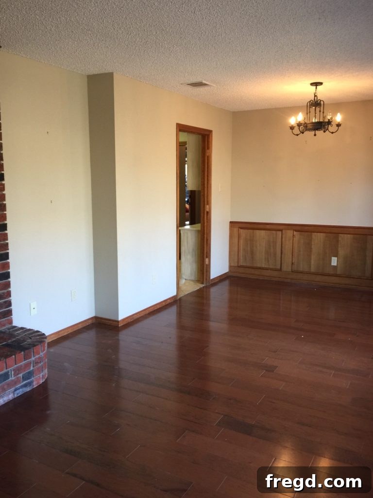Before photo of a long, purposeless room at the front of the Davis house, awaiting transformation into a play area.