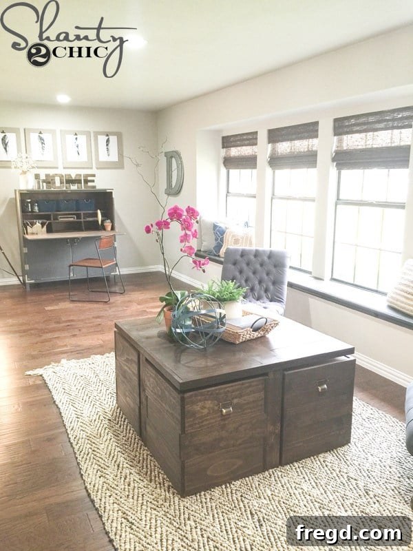 After photo of a custom-built rolling storage ottoman coffee table in the Davis play room, perfect for Legos.