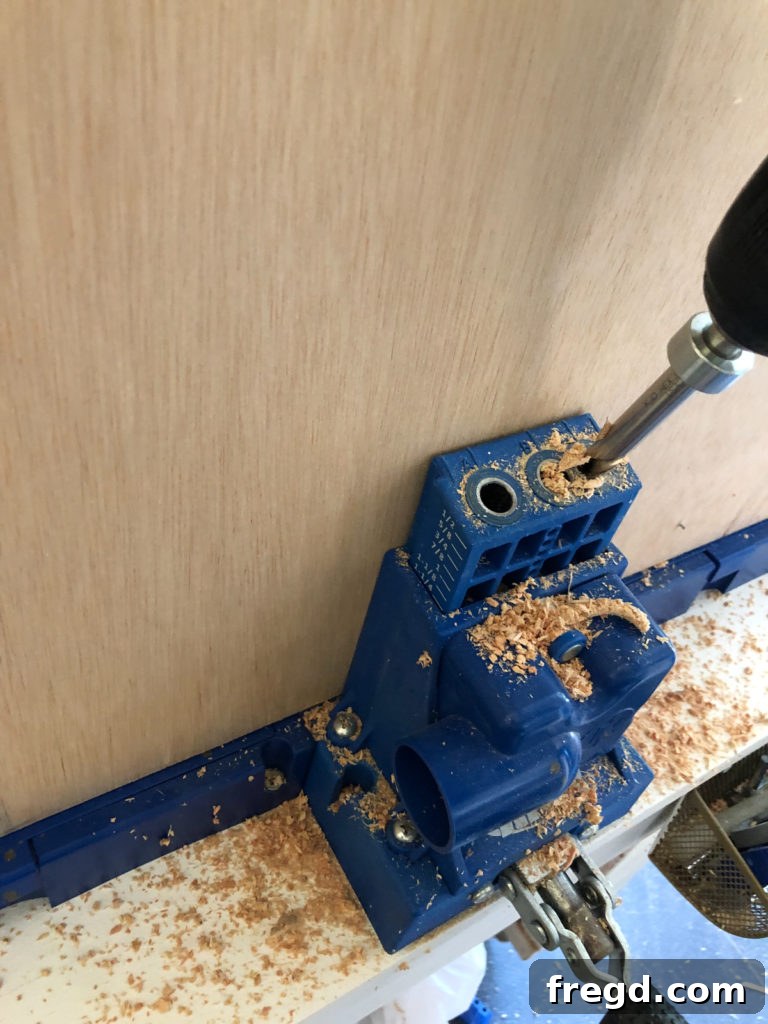 Adding 3/4-inch pocket holes along every edge of the back plywood panel