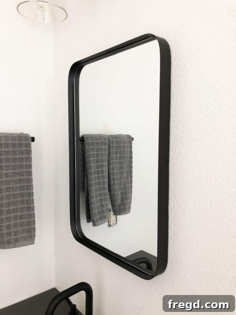 Round mirrors above bathroom vanity