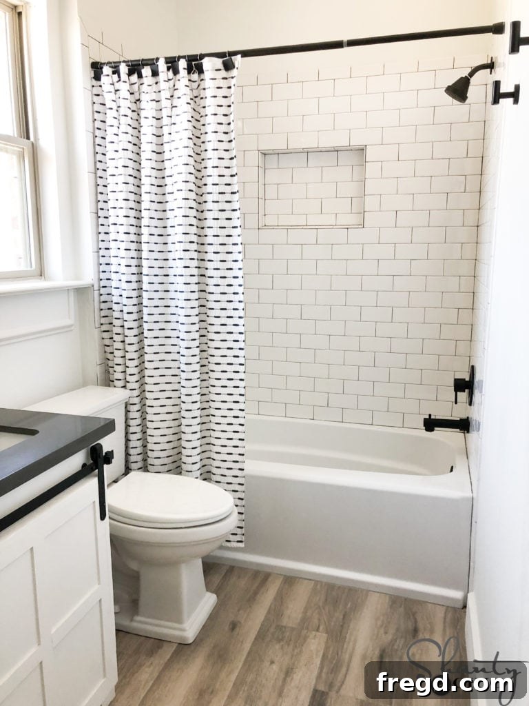 Wide shot of the boys' modern farmhouse bathroom