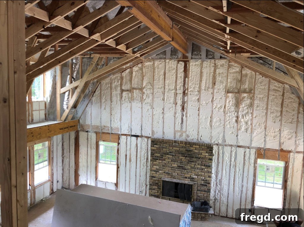 Shanty2Chic Flip House Episode 2: Spray foam insulation being installed in exterior walls