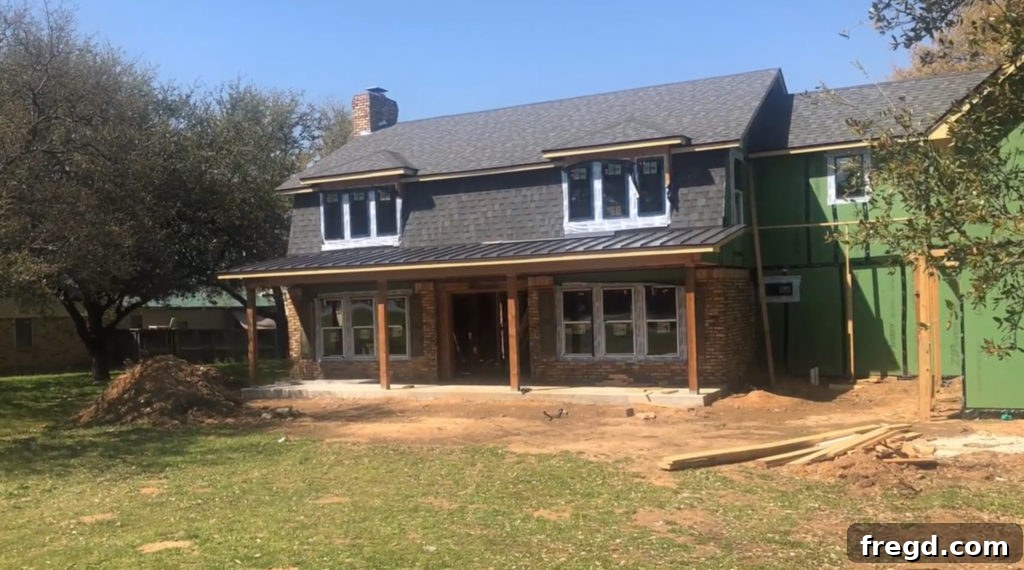Shanty2Chic Flip House Episode 2: Installation of new roof with composition shingles and metal accents