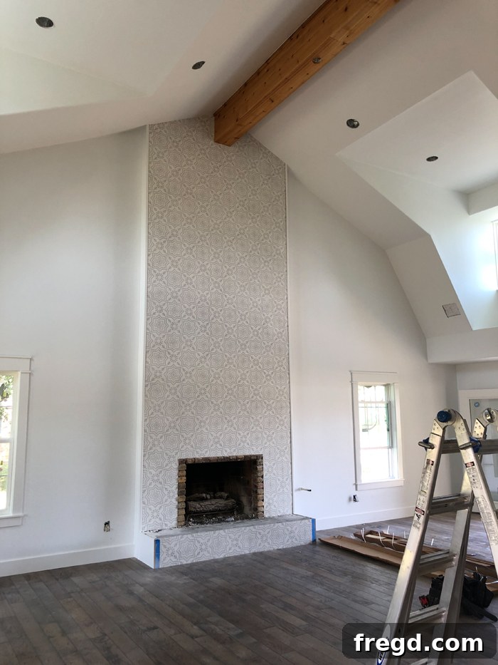 Shanty2Chic House Flip: Episode 3 3 Elegant fireplace with Emma Grey encaustic tile from Riad Tile extending to the ceiling