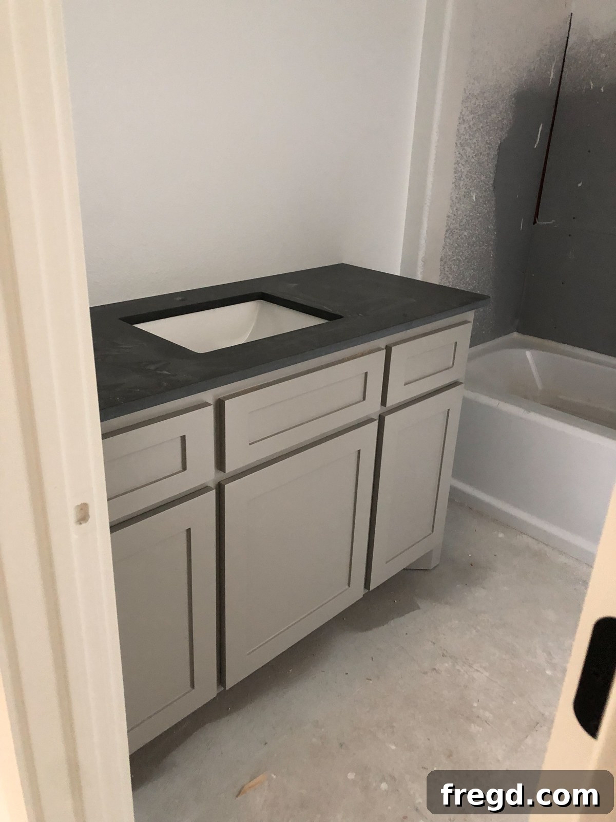 Shanty2Chic House Flip: Episode 3 5 Metropolis Dark quartz countertop from Arizona Tile, displaying its elegant grey-black, honed-like finish