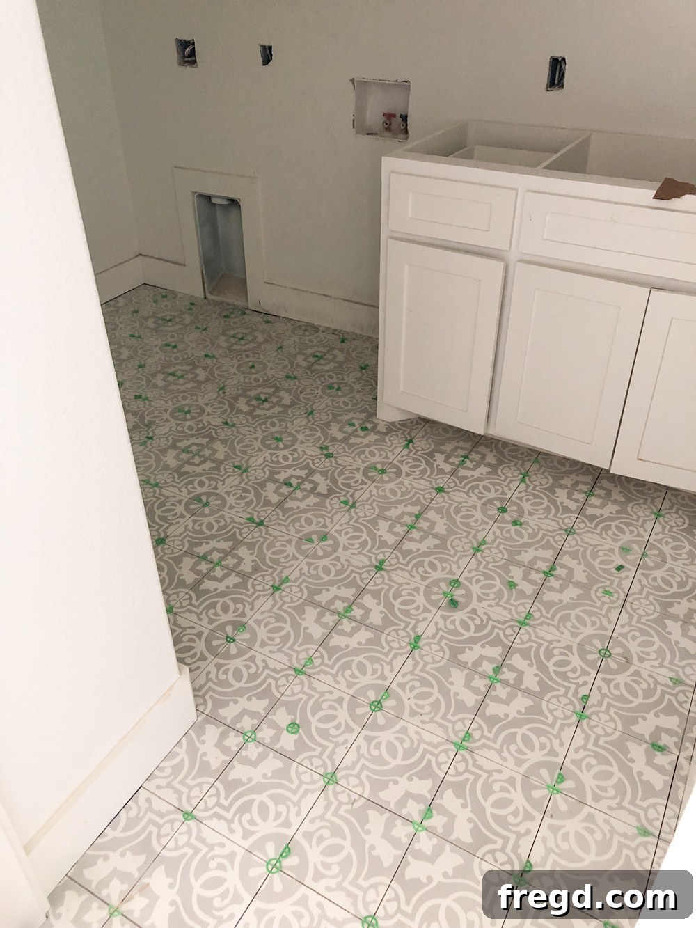 Shanty2Chic House Flip: Episode 3 9 Laundry room floor with beautiful Charlotte Grey encaustic tile from Riad Tile