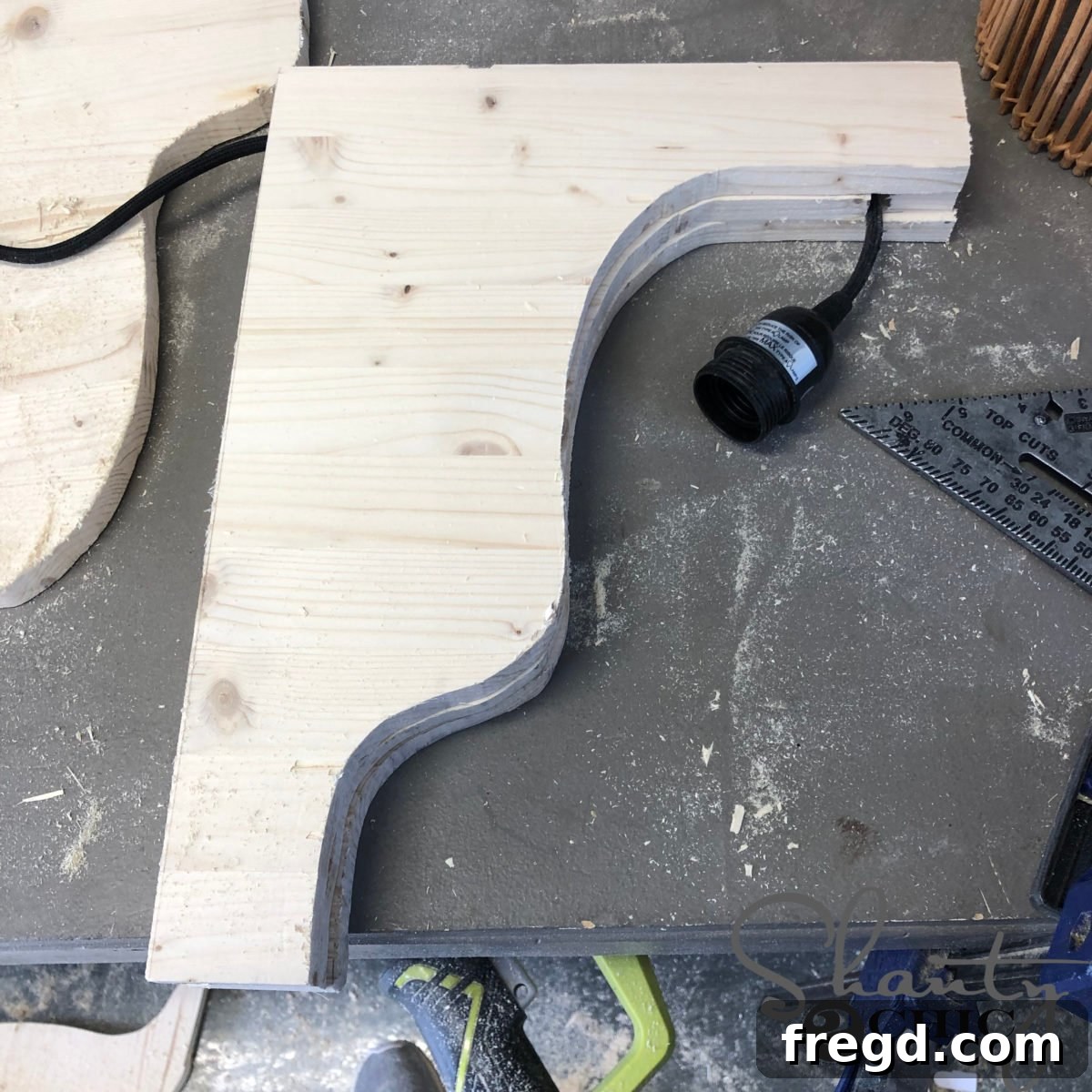 The Shanty Flip Episode 6 12 Securing the final corbel piece with brad nails to complete the assembly