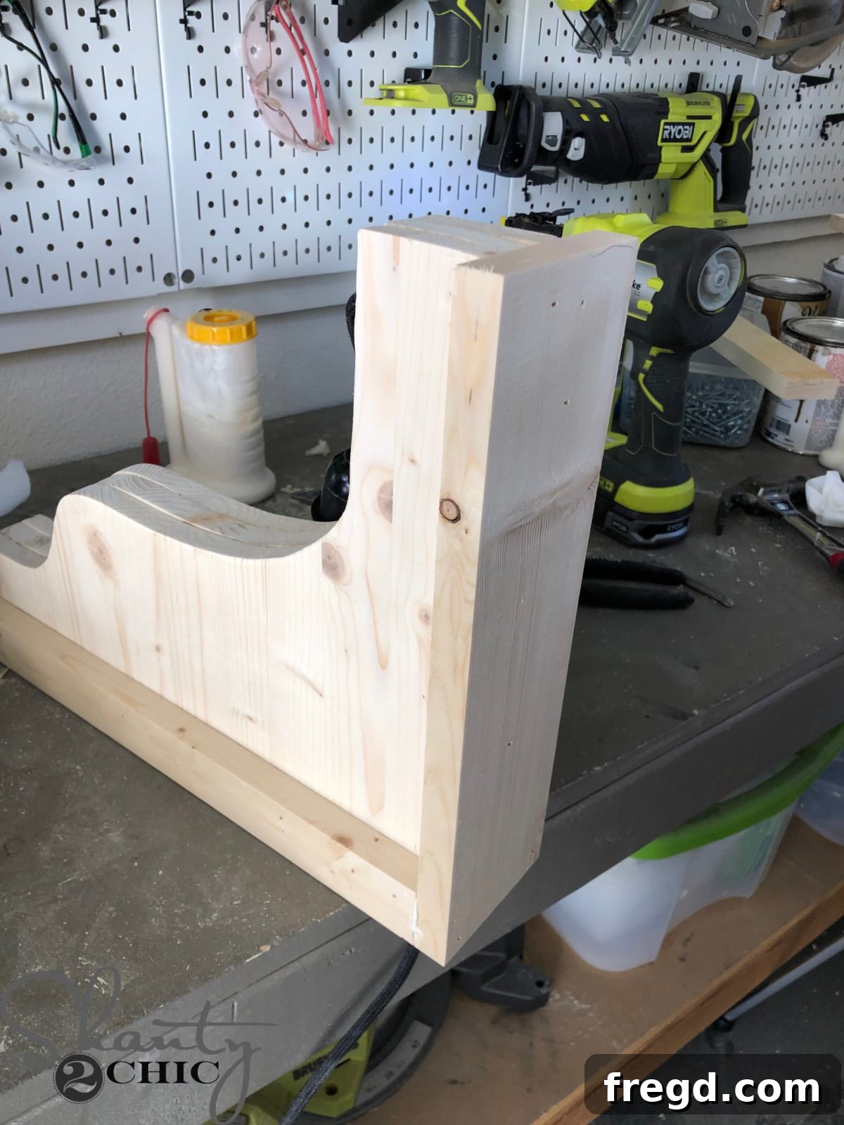 The Shanty Flip Episode 6 15 Attaching the top trim piece to the corbel, completing its framed appearance