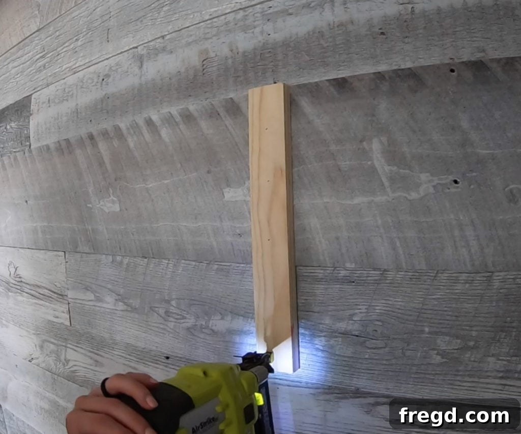 The Shanty Flip Episode 6 16 The cleat securely attached to the planked wall, ready for the corbel