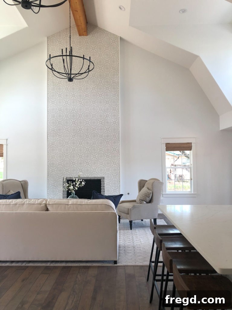 Paint Colors That Sell Your Flip House Fast 5 Spacious living room with Sherwin-Williams Pure White walls and minimalist decor