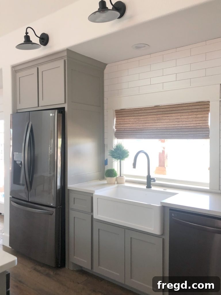 Paint Colors That Sell Your Flip House Fast 6 Modern kitchen with Sherwin-Williams Dorian Gray cabinets and Pure White walls