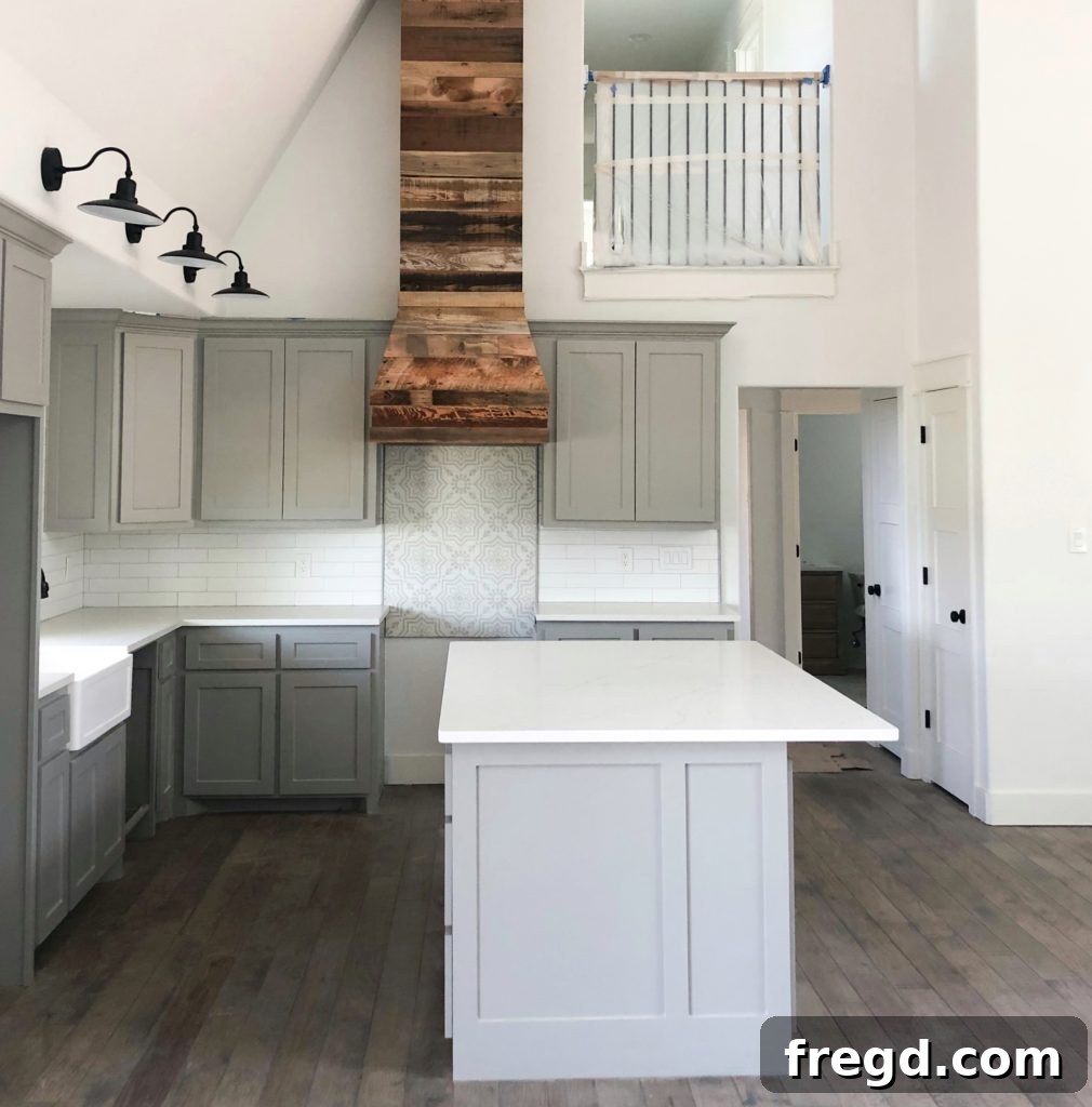 Paint Colors That Sell Your Flip House Fast 8 Overview of a stylish kitchen with gray cabinets and a mix of textures