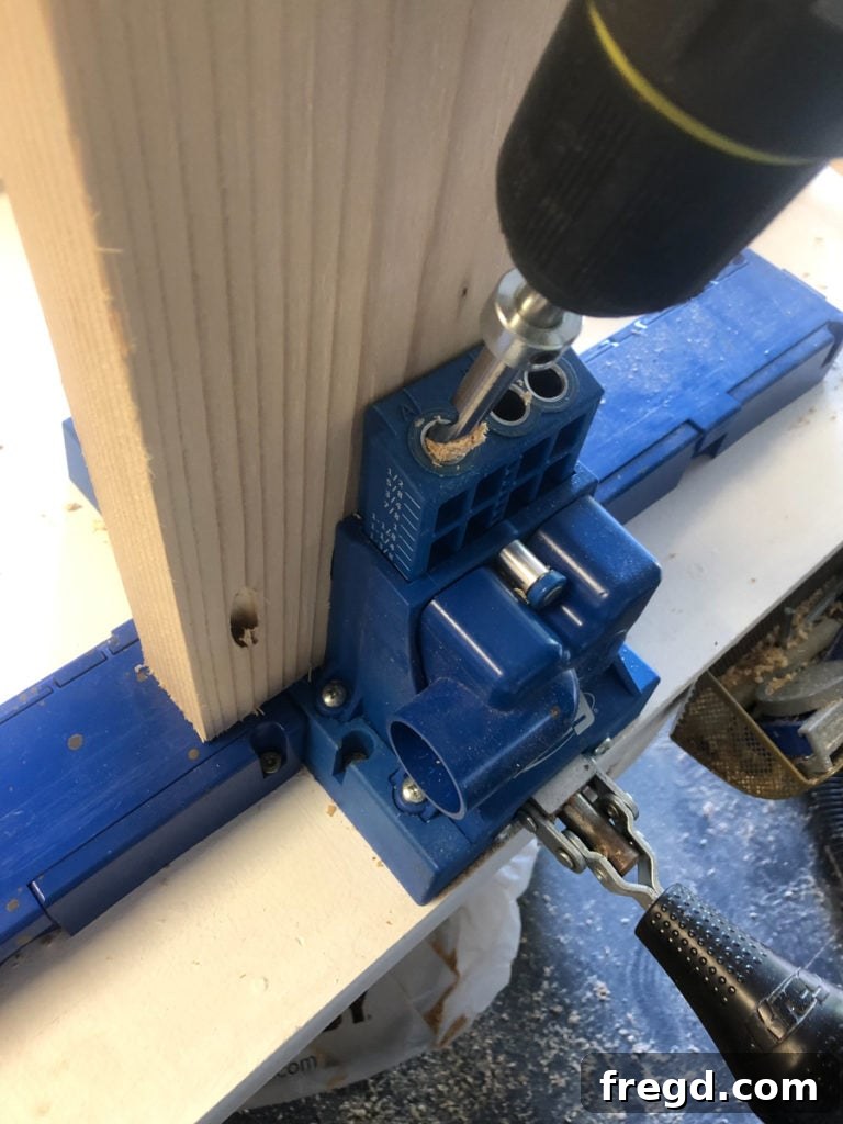 Close-up of the bottom runner attachment to the table leg base.