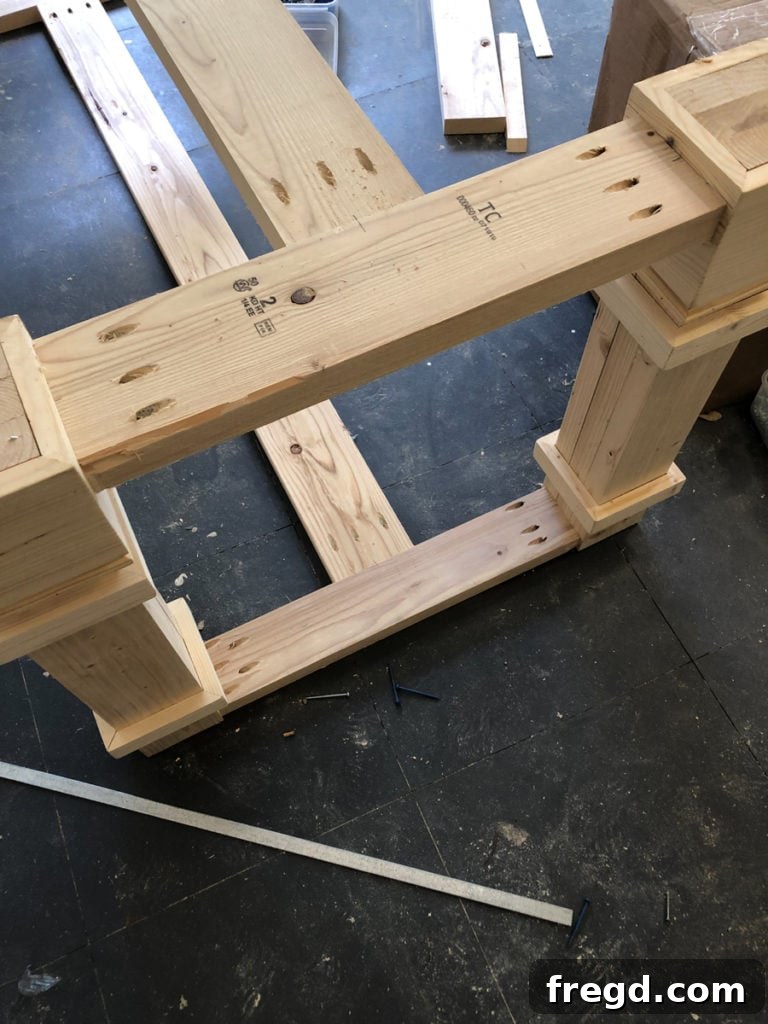 The growing table base structure with the bottom runner securely attached.