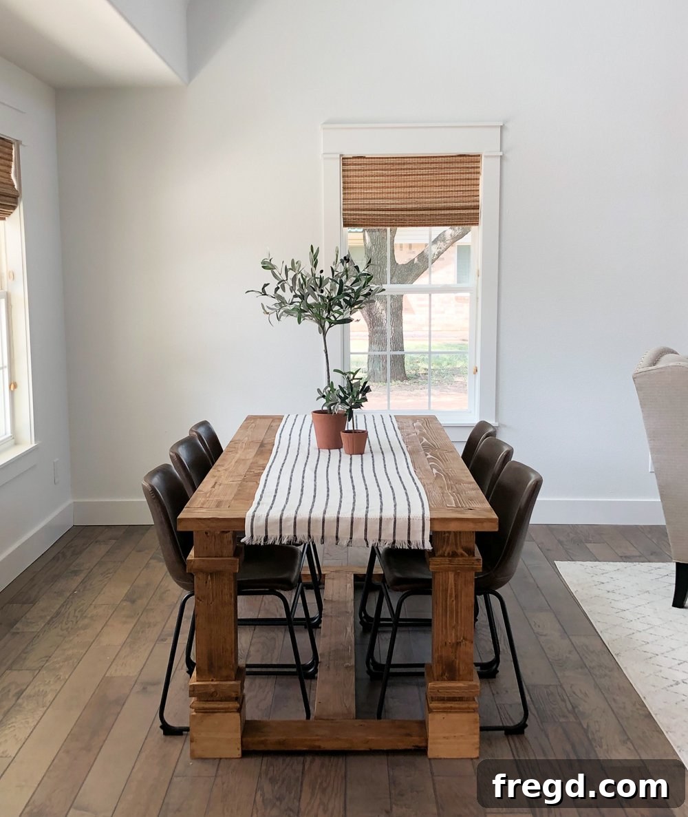 Close-up of the dining table and decor, emphasizing the detailed woodworking and inviting aesthetic.