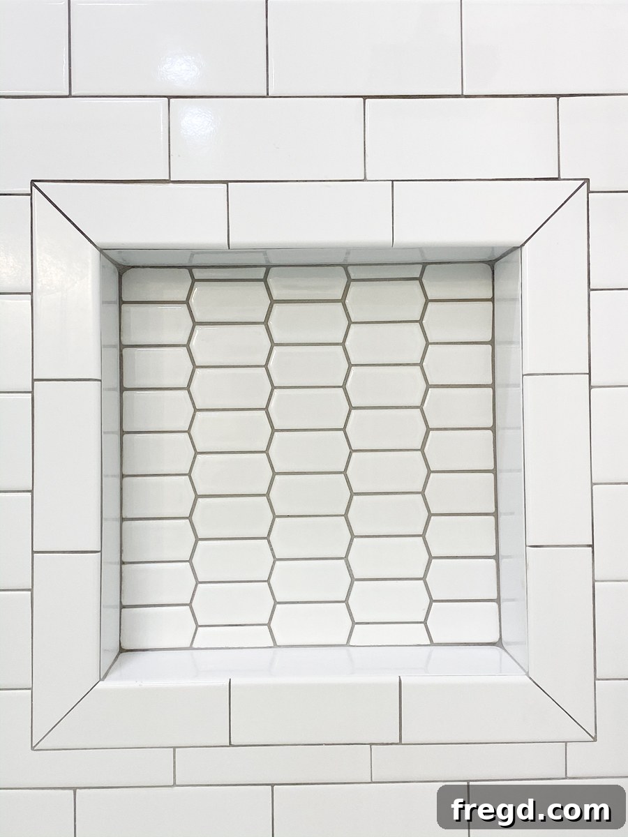Detailed view of the picket tile in a bathroom niche, showcasing its unique pattern.