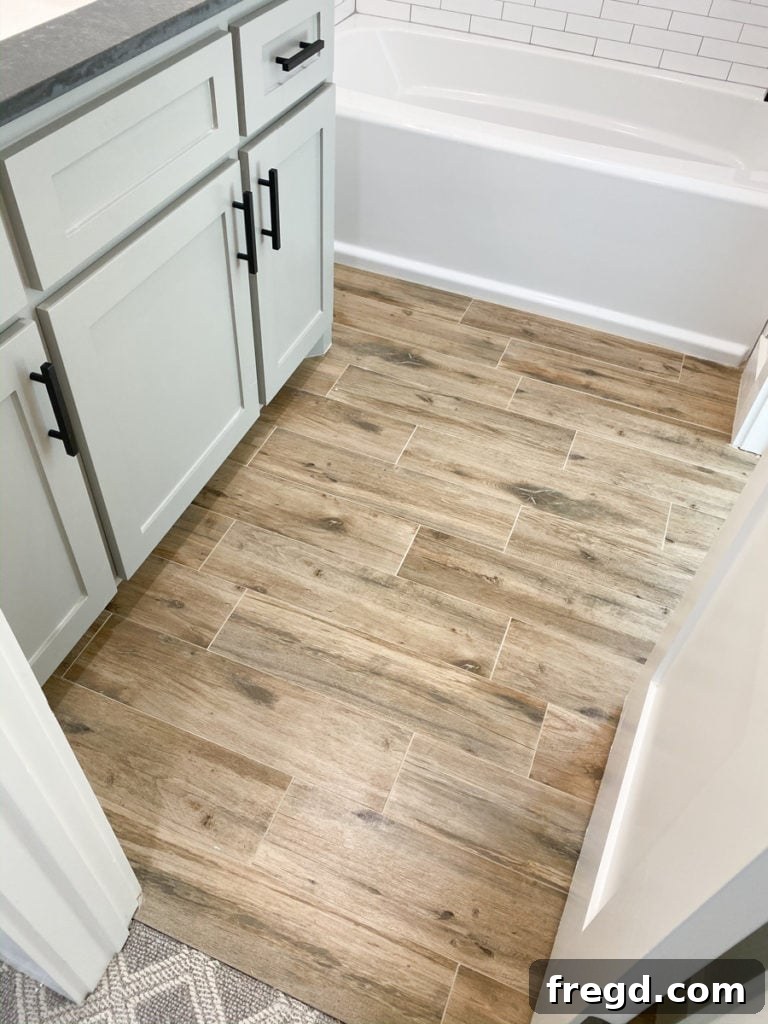 Beautifully installed wood-look porcelain tile flooring in an upstairs room.