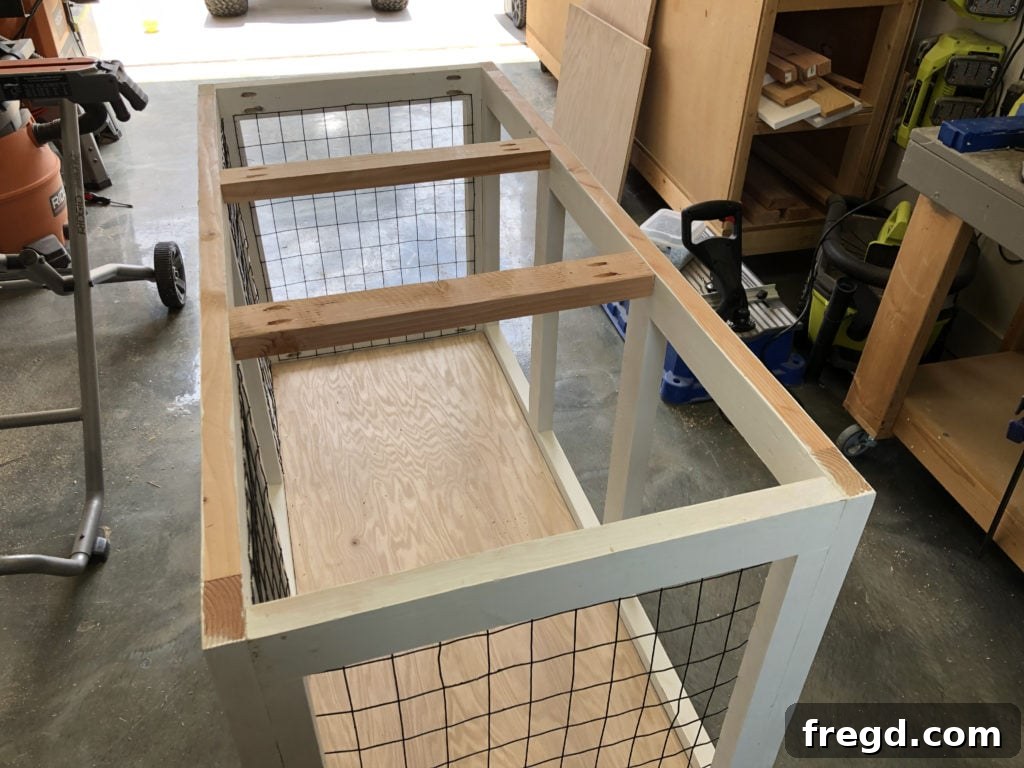 Attaching top supports for the dog crate console