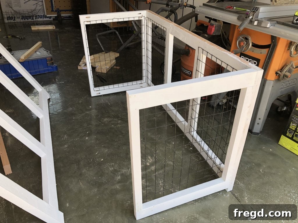 Attaching side panels to the back frame of the dog console