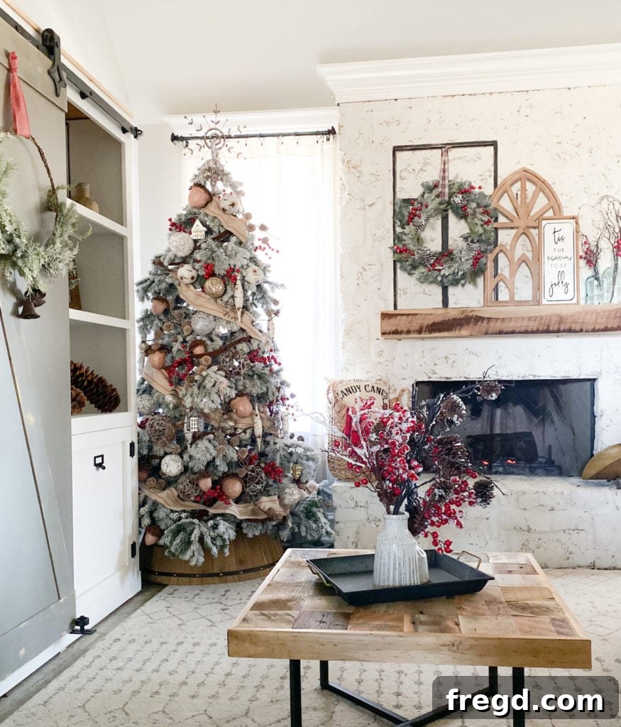 A wide shot of the fully decorated Rustic Woodland Christmas Tree, showcasing its complete festive ambiance.