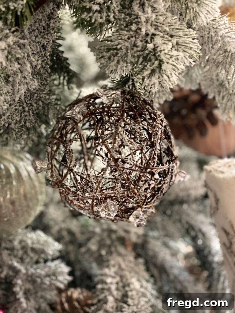 An intricate pinecone ornament, part of the rustic woodland theme.
