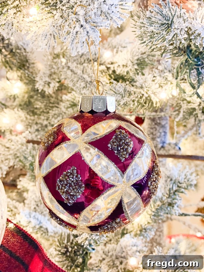 Sylvan Charm Christmas Tree 12 Small, sparkling white spherical ornament with a textured surface.