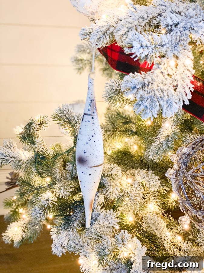 Sylvan Charm Christmas Tree 6 A natural woven tree collar elegantly concealing the base of the Christmas tree.