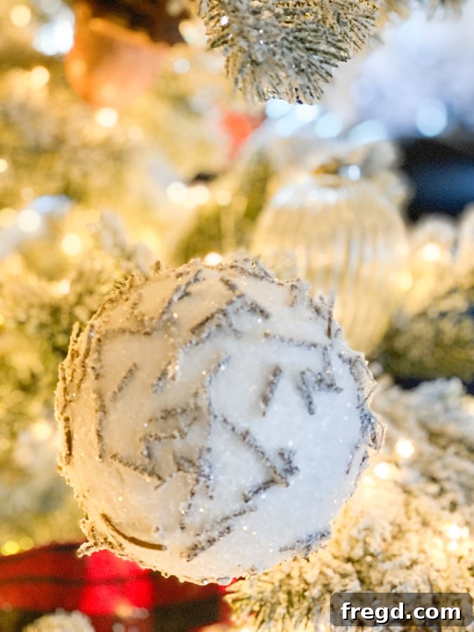 Sylvan Charm Christmas Tree 9 Rustic deer ornament with a frosted finish, blending seamlessly with the woodland theme.