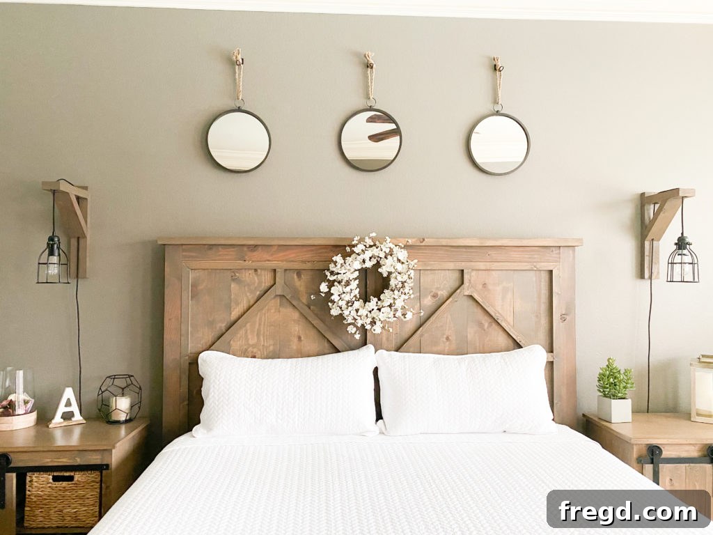 Two adorable circular mirrors with natural jute rope hangers, adding bohemian charm to a wall.