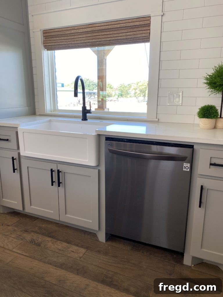 Shanty House Flip: The Nitty-Gritty Guide 12 LG Top Control Wi-Fi Enabled Dishwasher in black stainless steel.