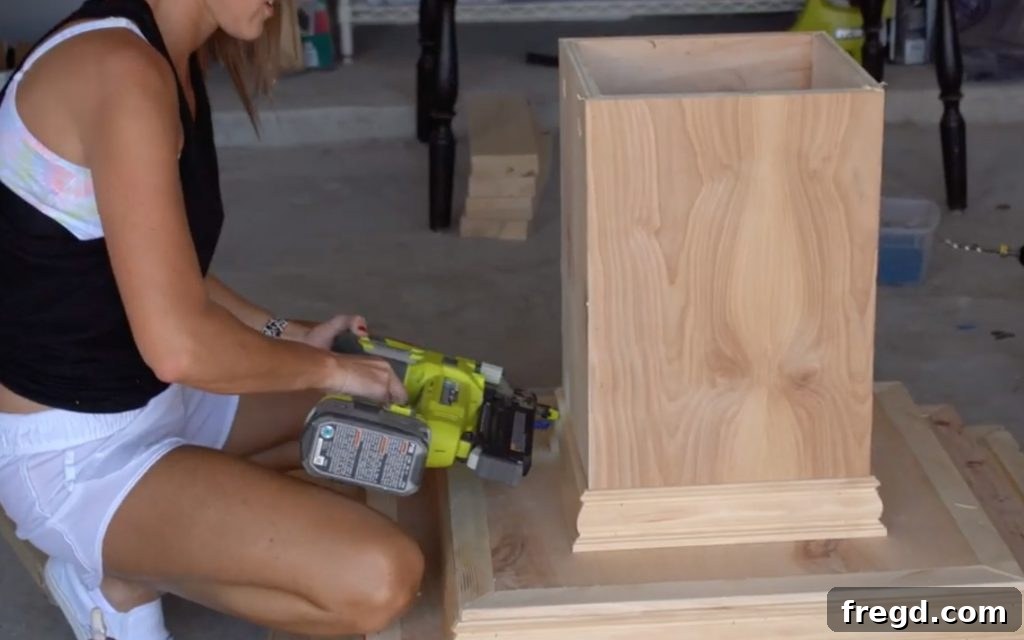 First row of trim being attached to the trunk.