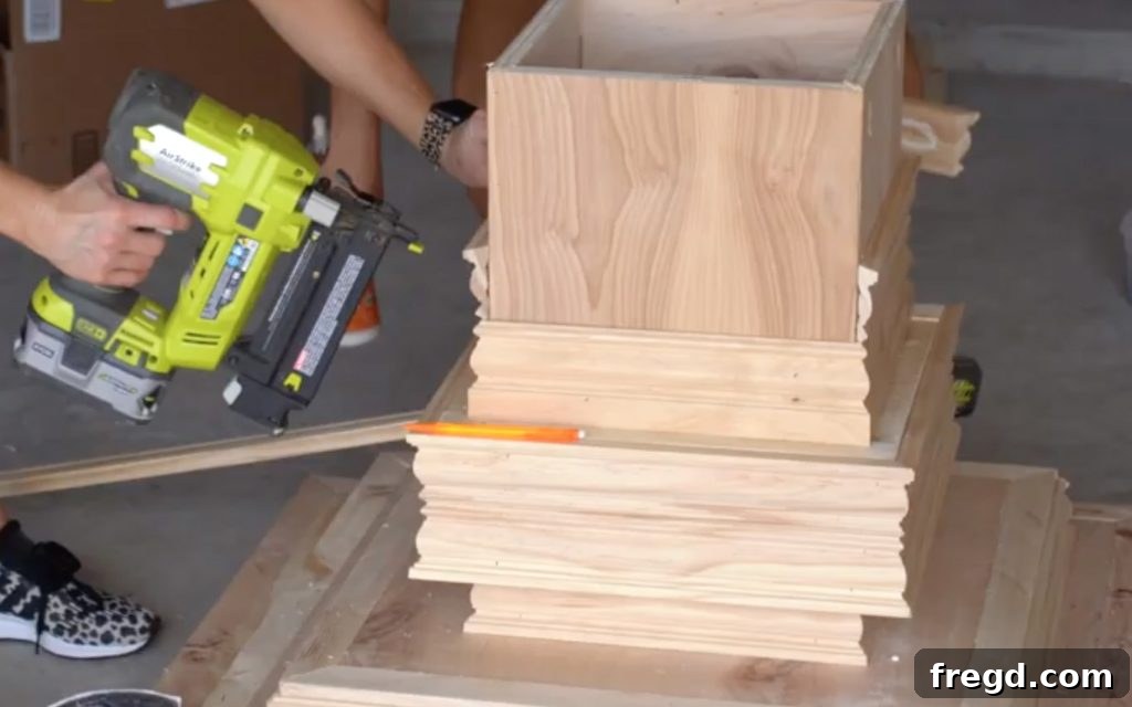 Fourth and fifth rows of trim completing the decorative trunk design.