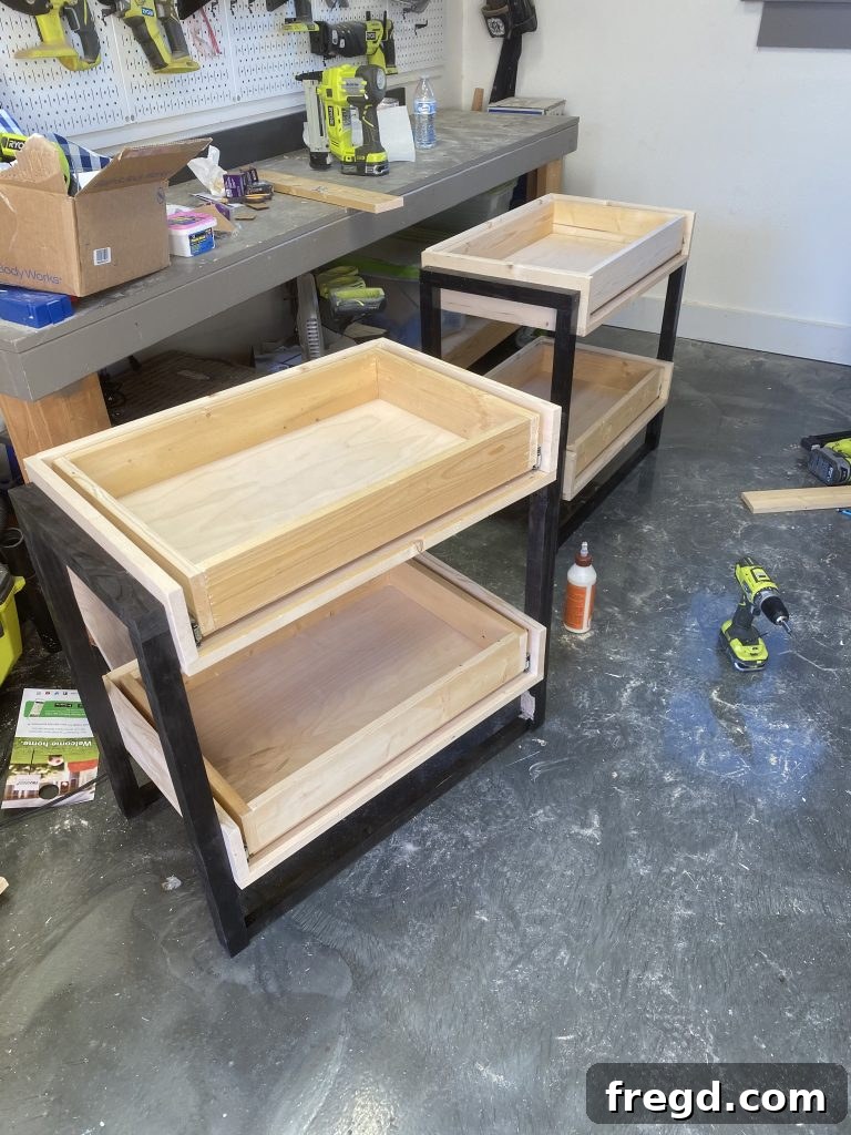 Installing drawer slides and drawer boxes into the nightstand shelves
