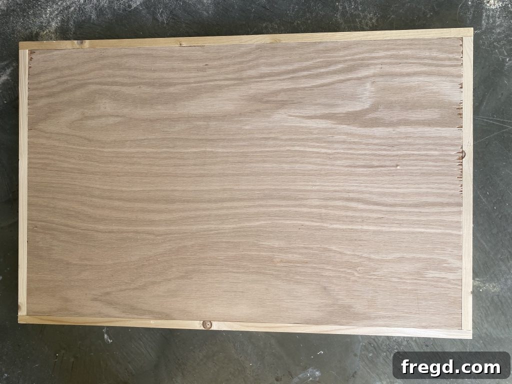 Completed shelf panel with all trim pieces securely attached