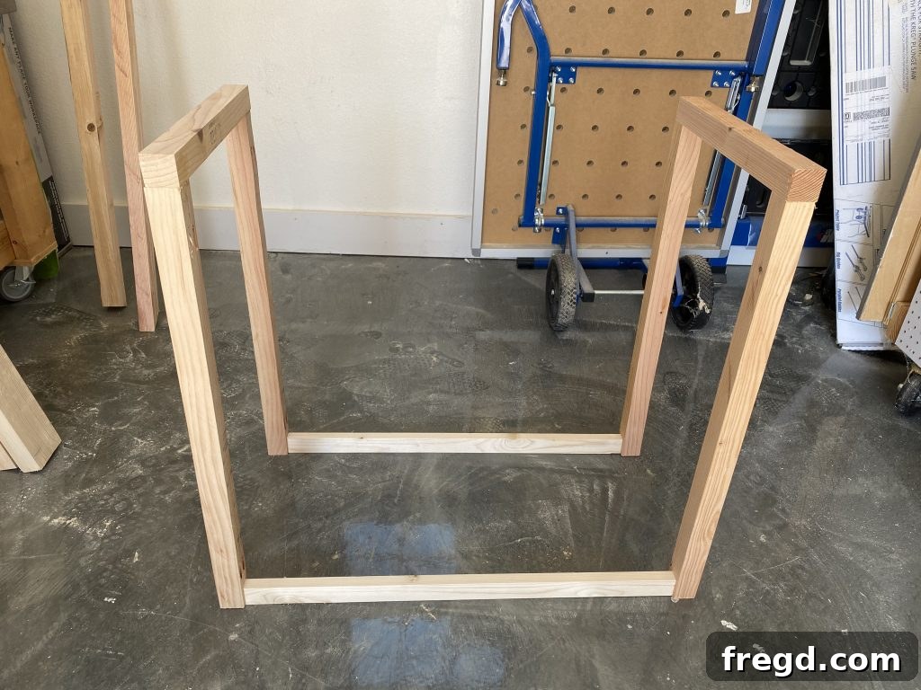 Attaching bottom rails to the assembled side frames