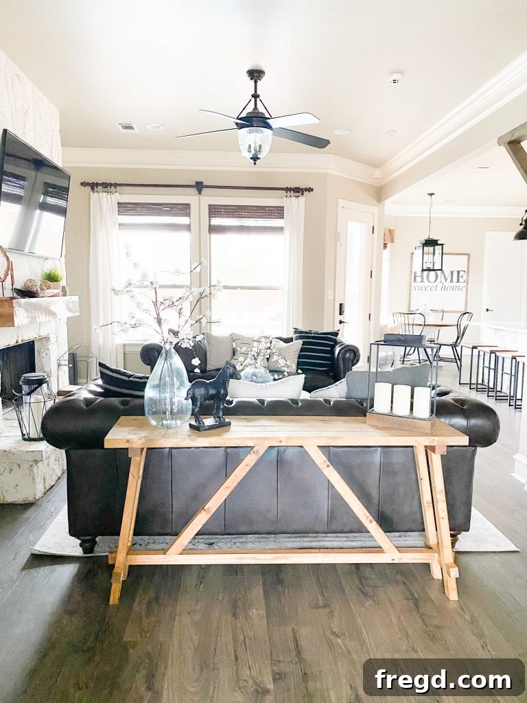 Front view of the completed stained angled console table in a stylish setting.