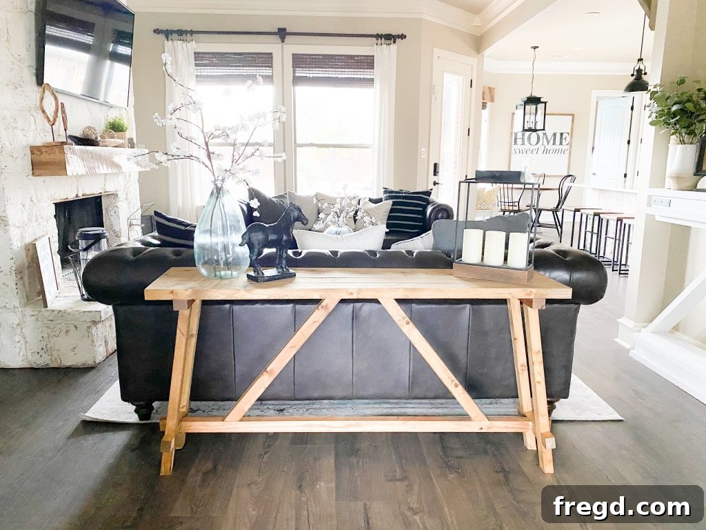 Angled view of the finished console table, highlighting its unique geometric legs.