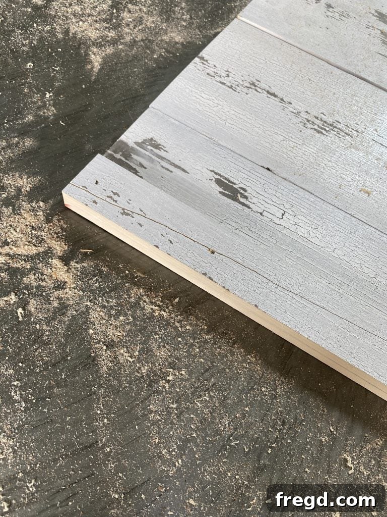 Attach trim to barn wood doors