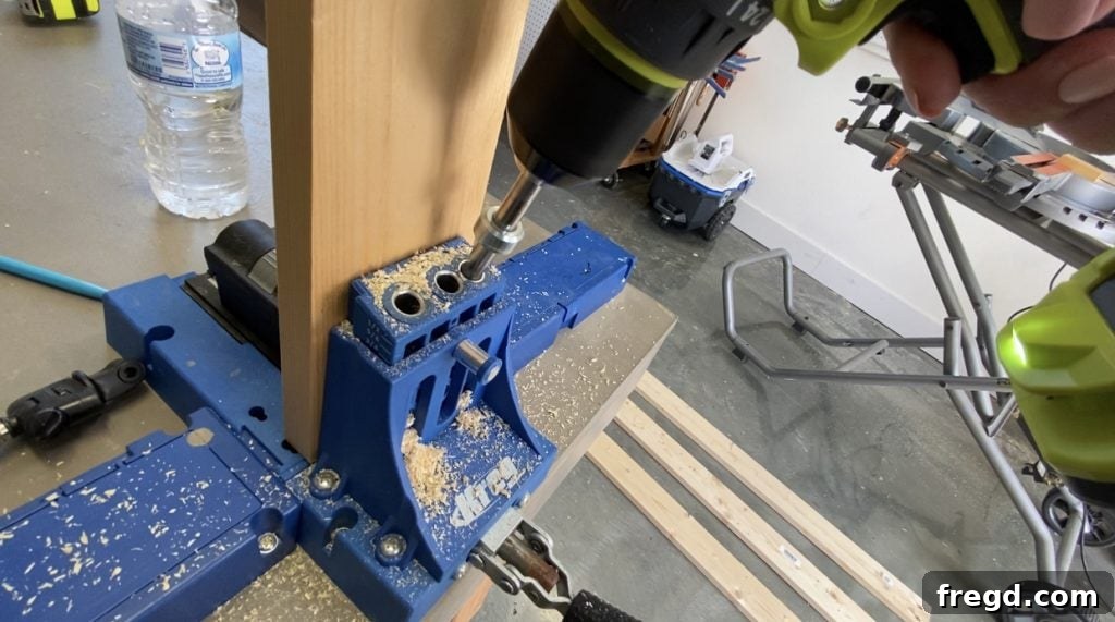 Drilling pocket holes and assembling the outer frame of the barn door.