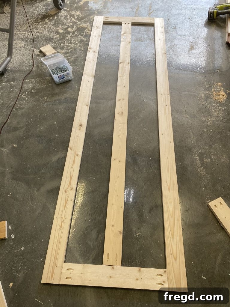 Adding the middle frame board to provide central support.