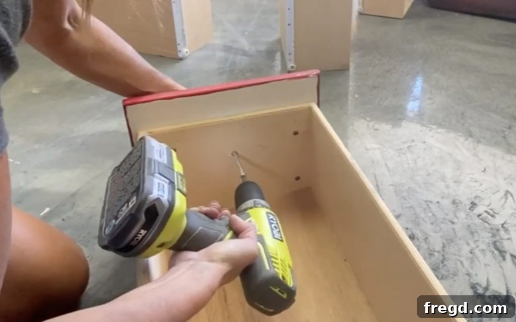 Your Guide to Furniture Makeovers 7 Drawers removed and sanded, ready for new hardware