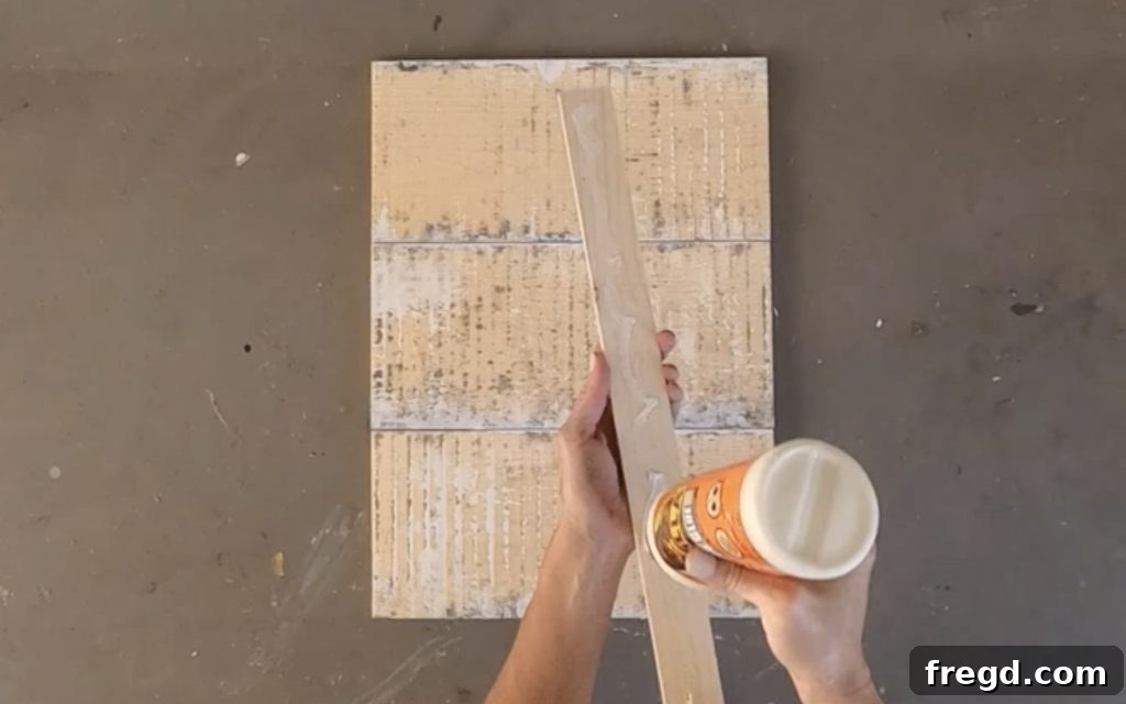 Applying wood glue to back support pieces.