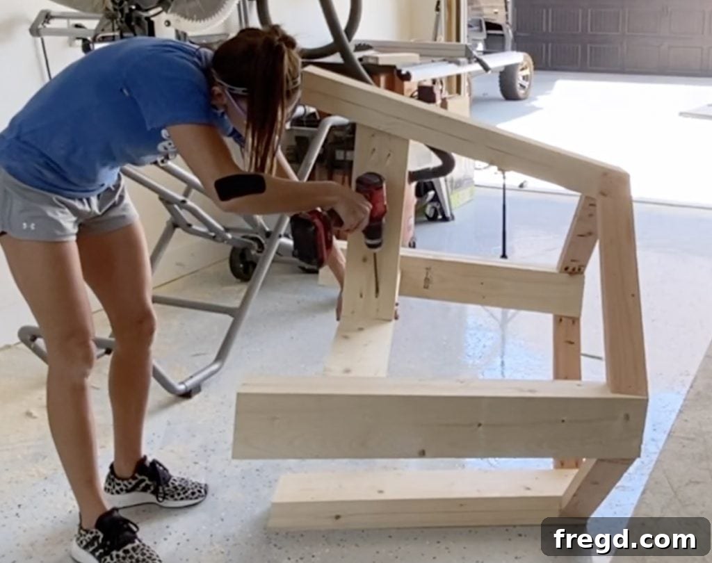 Securing the short runners to the table legs and the long runner using pocket hole screws.