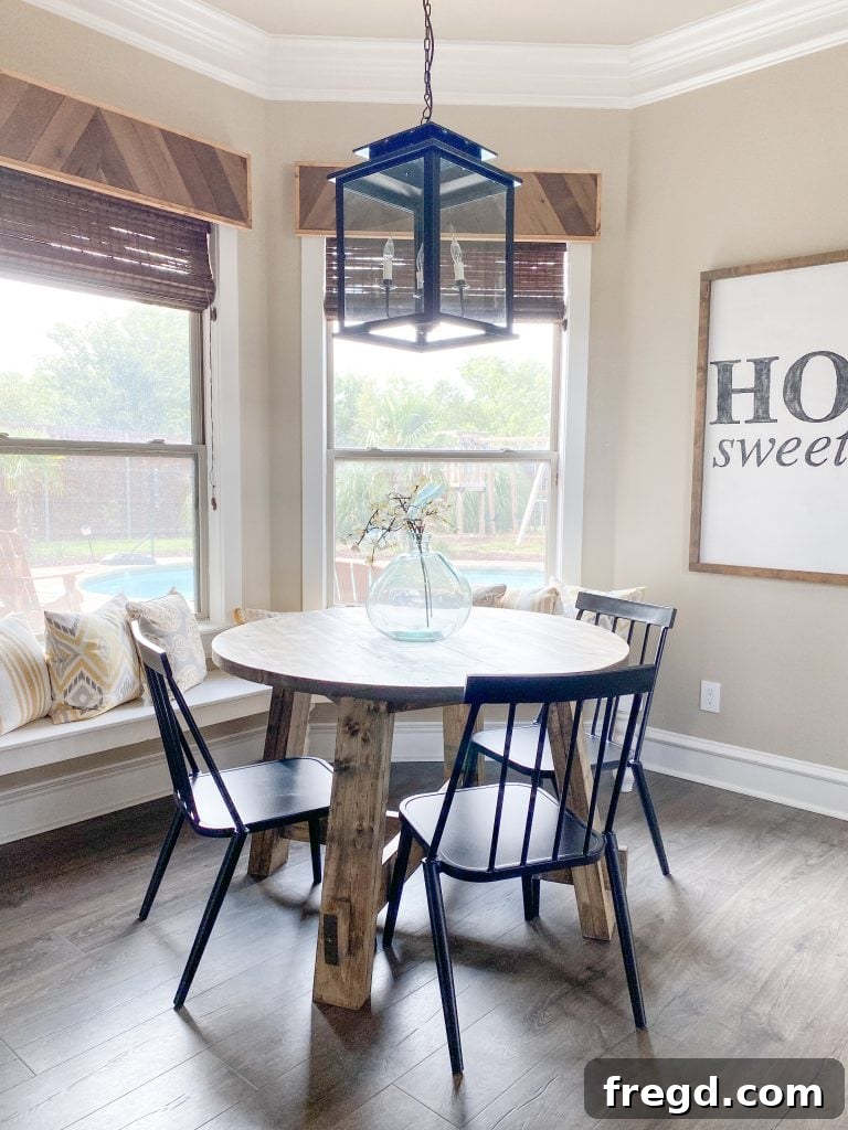 Another view of the DIY Round Dining Table, highlighting its spaciousness and inviting design.