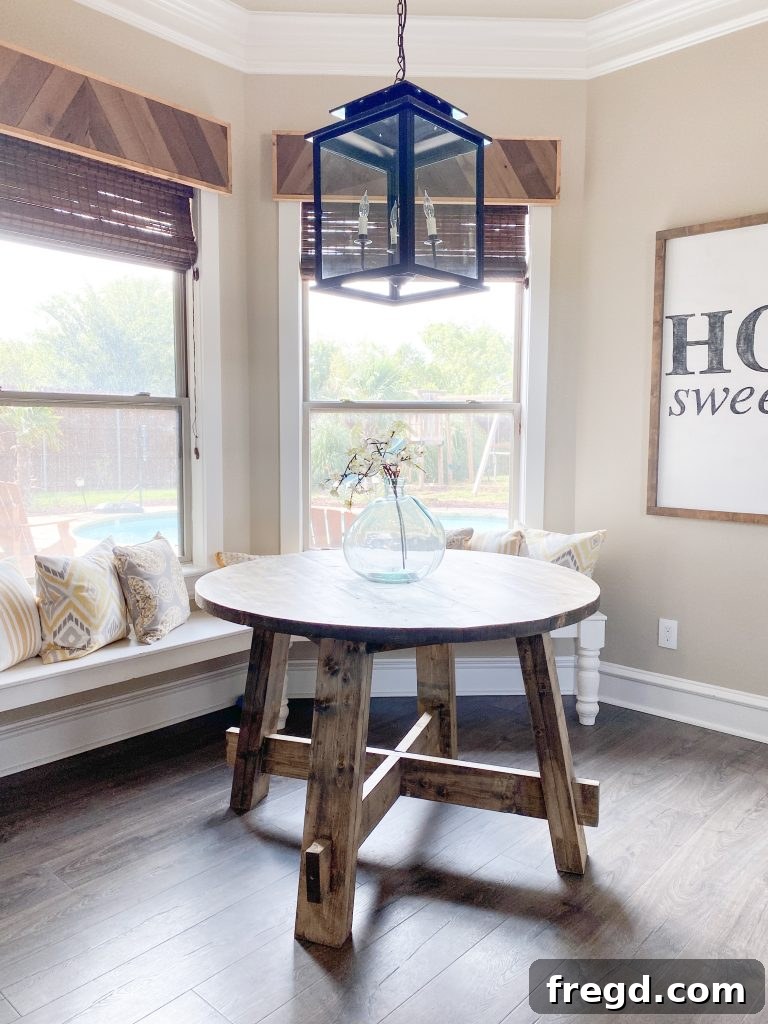 The DIY Round Dining Table from a different angle, showing its integration into a modern kitchen space.